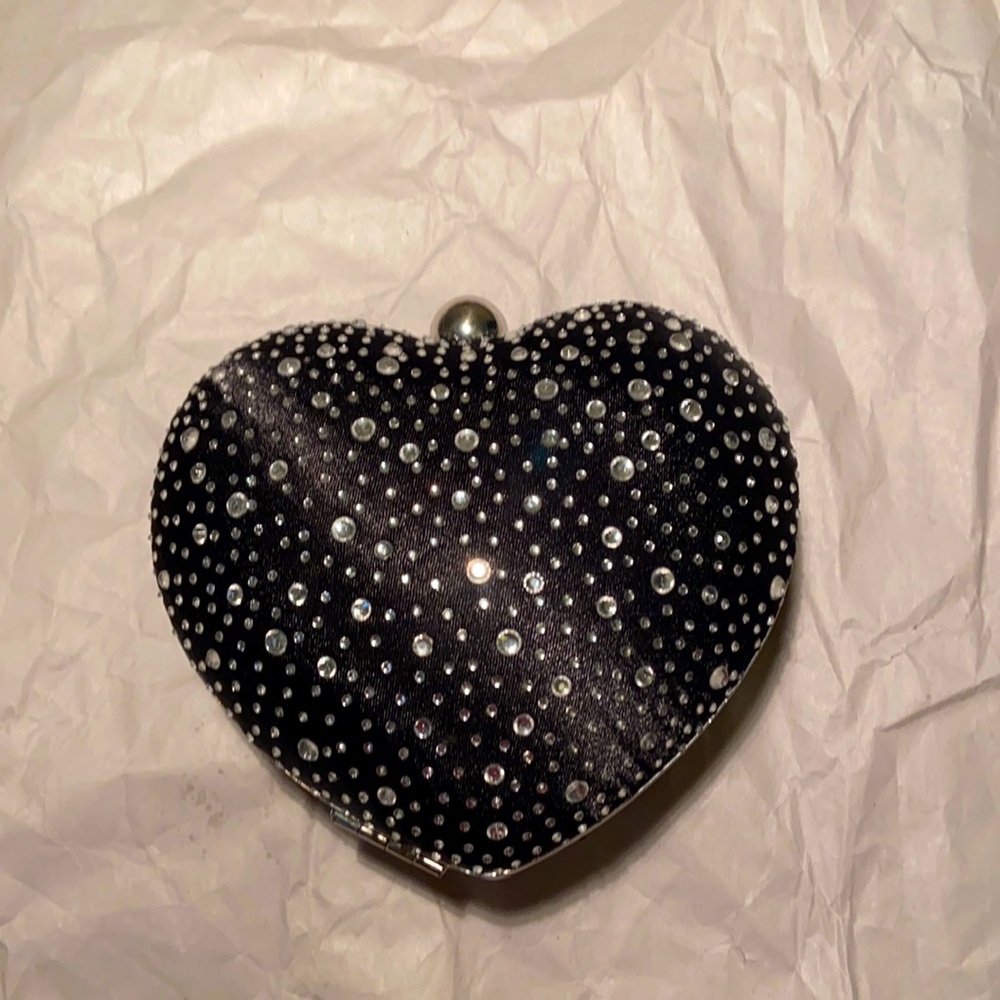 Heart shaped clutch bag with rhinestones